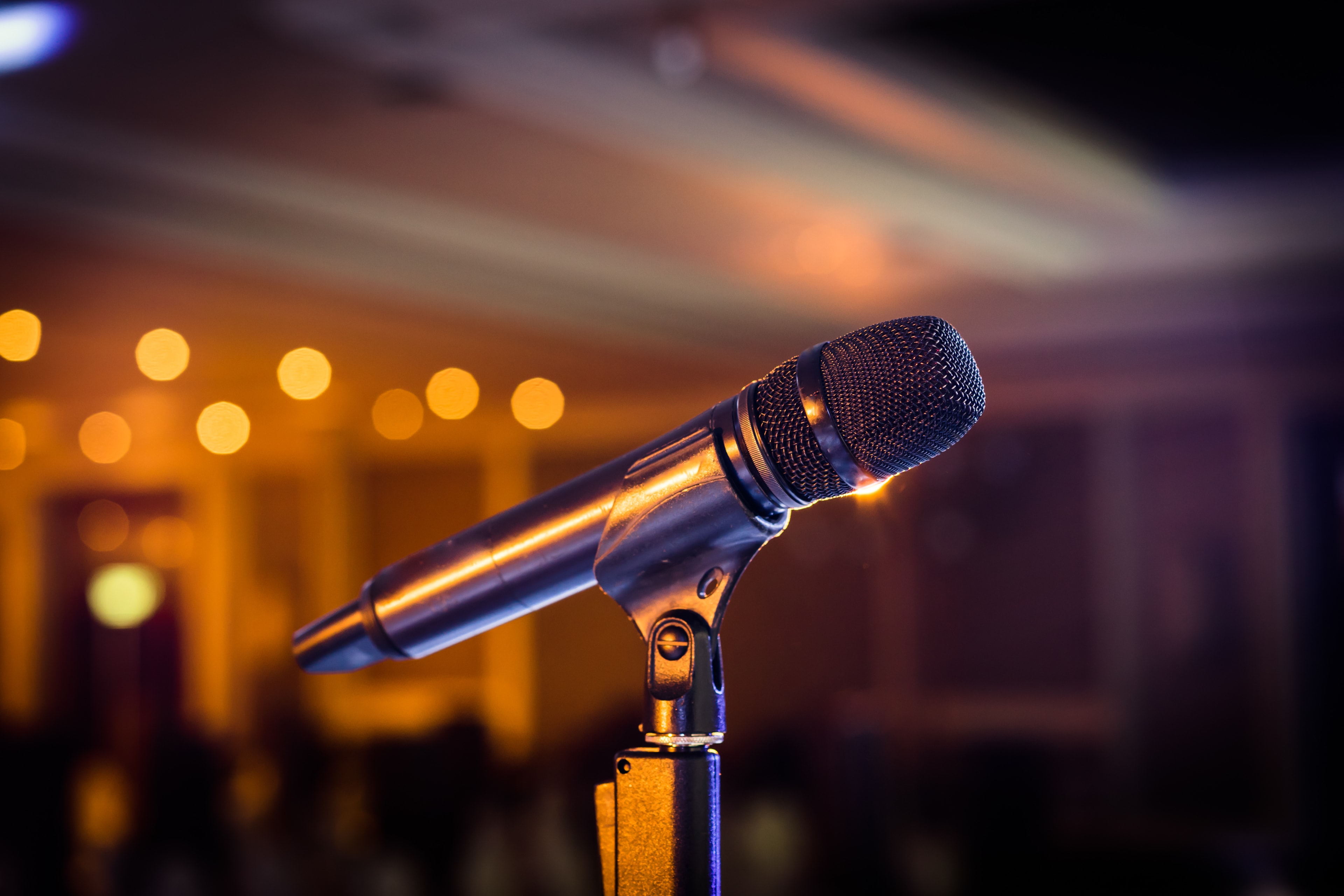 Professional AV technician setting up equipment at an event